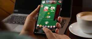 A live baccarat game on a mobile device.