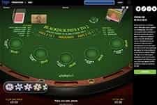 An in-game example from Premium Blackjack showing the table, chips, cards, and game details.