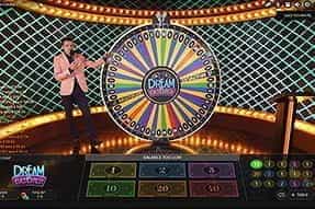 A live dealer spinning the rainbow prize wheel of Casumo's Dream catcher.