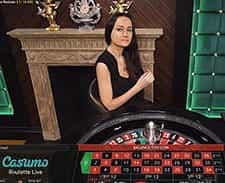 A live dealer at the Casumo roulette table.