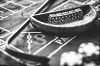 A black and white craps table.