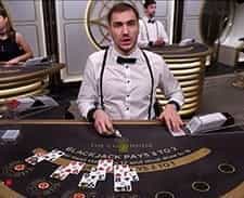 Image of a live dealer setting up a blackjack game at bwin casino