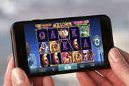 Image of a smarphone with a mobile video slot on the screen