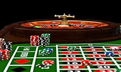 A roulette wheel, table and casino chips in an automated game.