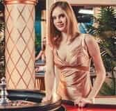 The embodiment of a classy casino live dealer, Sonja has a taste for baccarat.