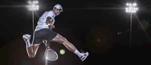 Tennis player hitting the ball