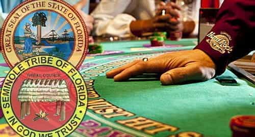 Alt Text: Badges of Florida state and Seminole tribe over a blackjack table.