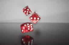 Red dice falling.