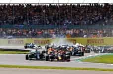 Max Verstappen leads Lewis Hamilton around the opening corners of the 2021 British GP.