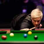 Neil Robertson concentrating on a shot.