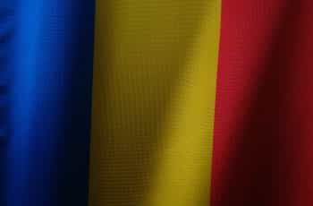 Close up of a blue, yellow, and red flag.