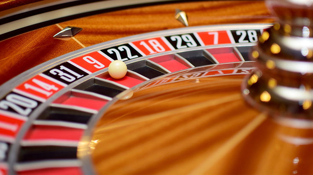 A Standard Roulette Wheel with the Ball on 23