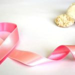 An image showing a pink ribbon in support of breast cancer awareness.