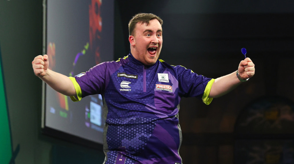 Luke Littler in action at the 2024 World Darts Championship.