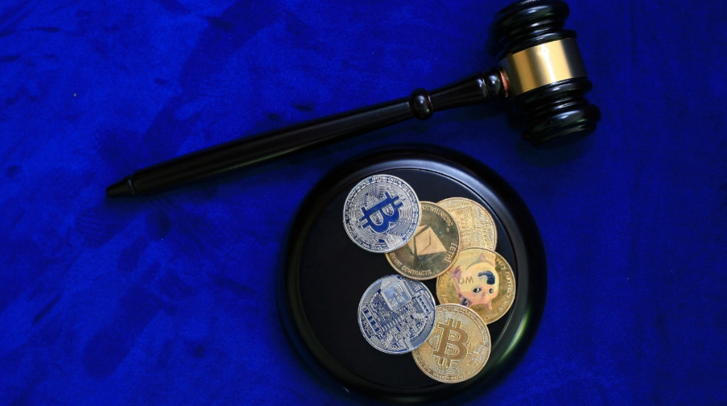 An Assortment of Crypto Coins and a Gavel