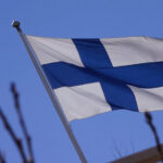 An Image Showing the Finland Flag Fluttering in the Wind.