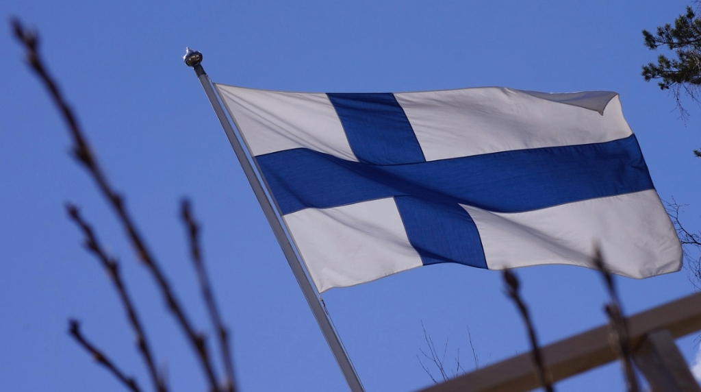 An Image Showing the Finland Flag Fluttering in the Wind.