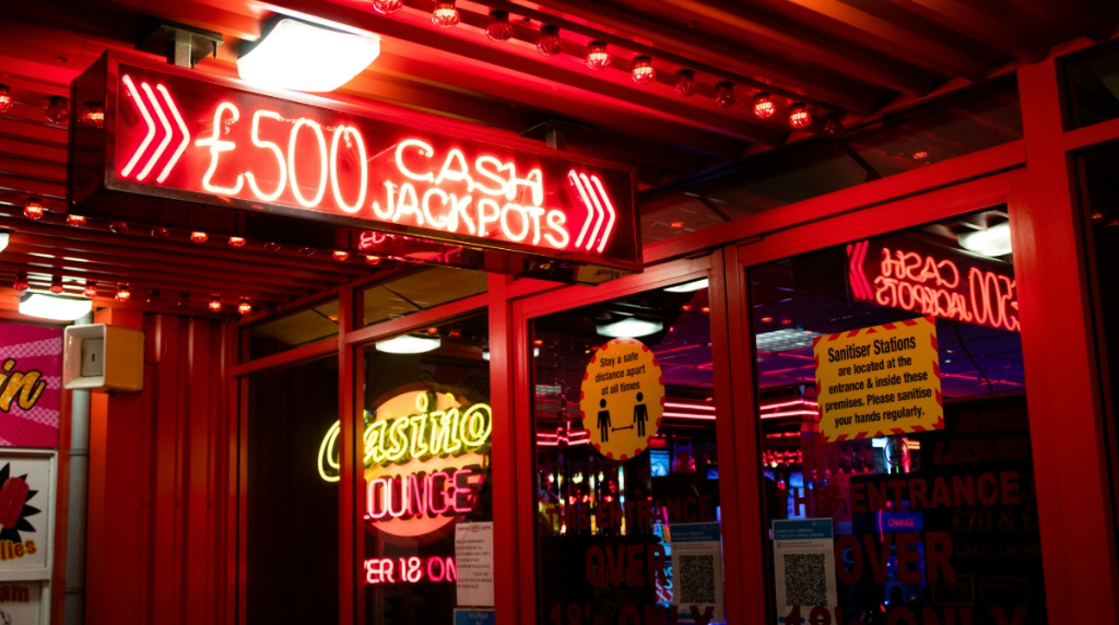 An Image of a Casino Sign Glowing in the Dark