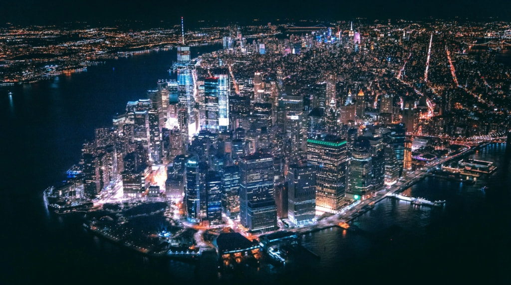 Aerial view of New York City skyline at night