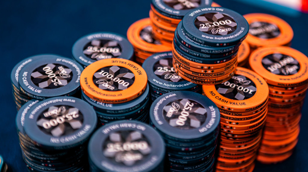 Several stacks of tournament poker chips.