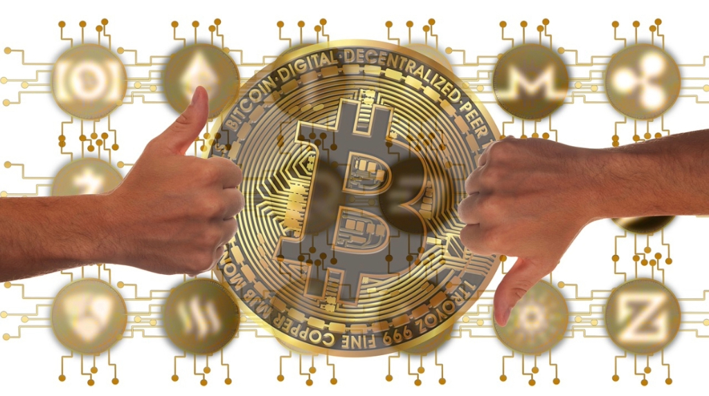 The Bitcoin Sign with a Thumbs Up and a Thumbs Down