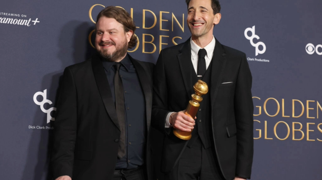 Brady Corbet and Adrien Brody at the 82nd Annual Golden Globe Awards.