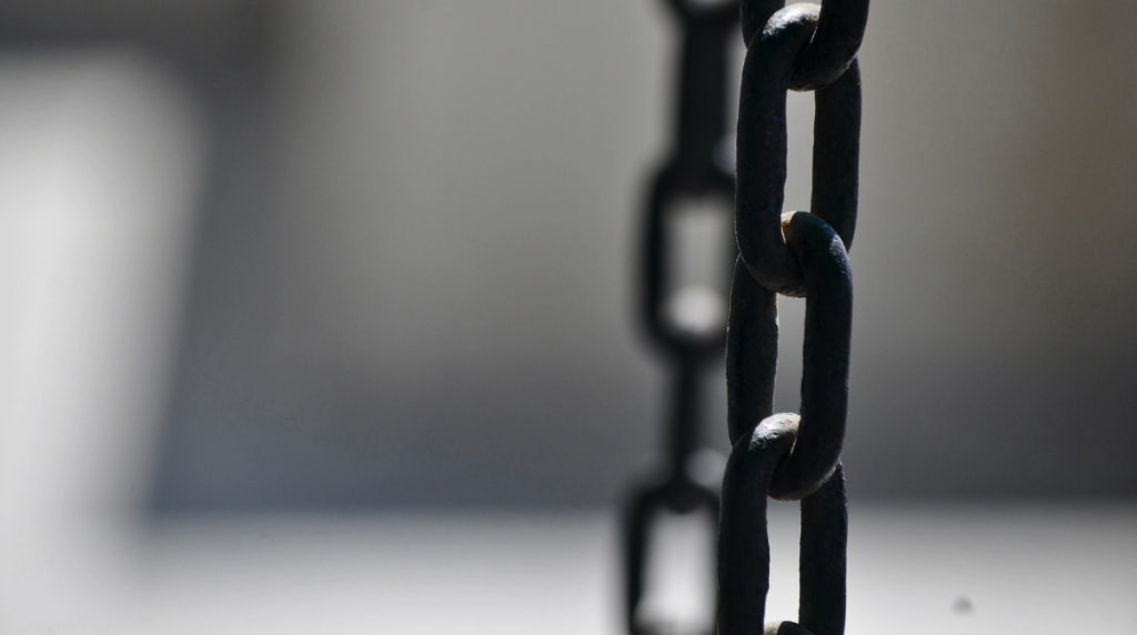 Chain on a Greyish Background