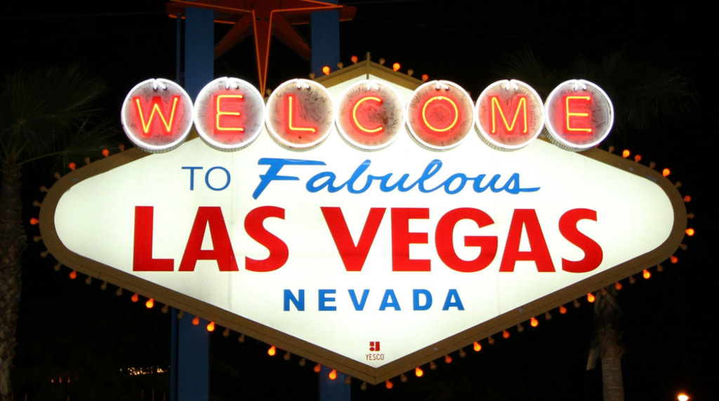 Welcome to Fabulous Las Vegas Sign lit at night.