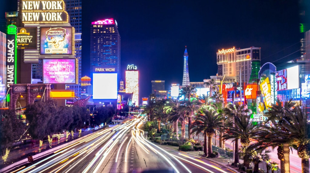 Las Vegas Strip at night, illuminated by neon lights