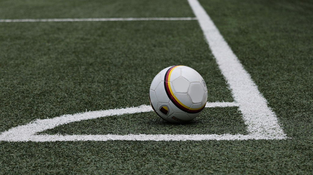 A Football Near the Corner Flag of the Pitch