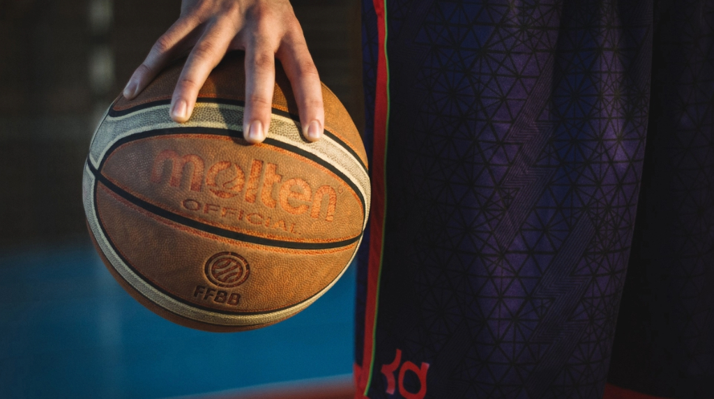 A Person Holding a Basketball